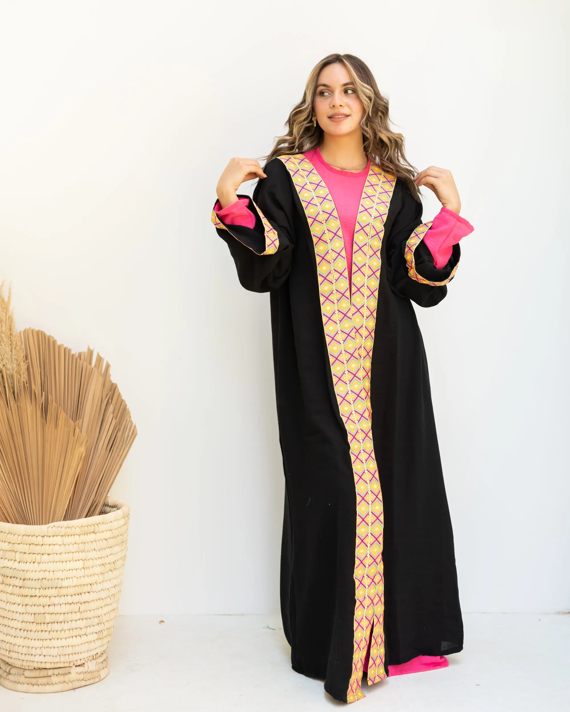 Black cloak with zigzag tape