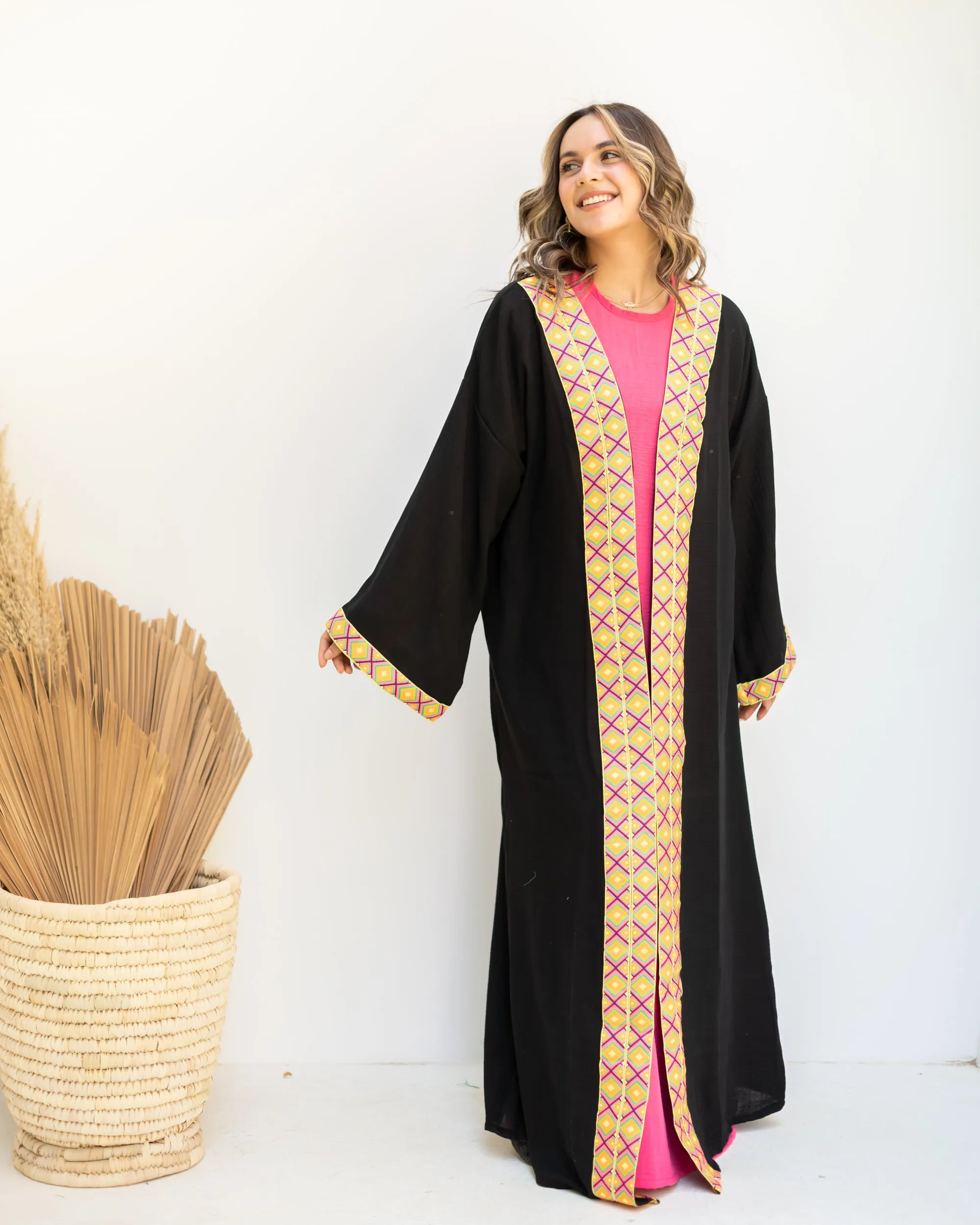 Black cloak with zigzag tape